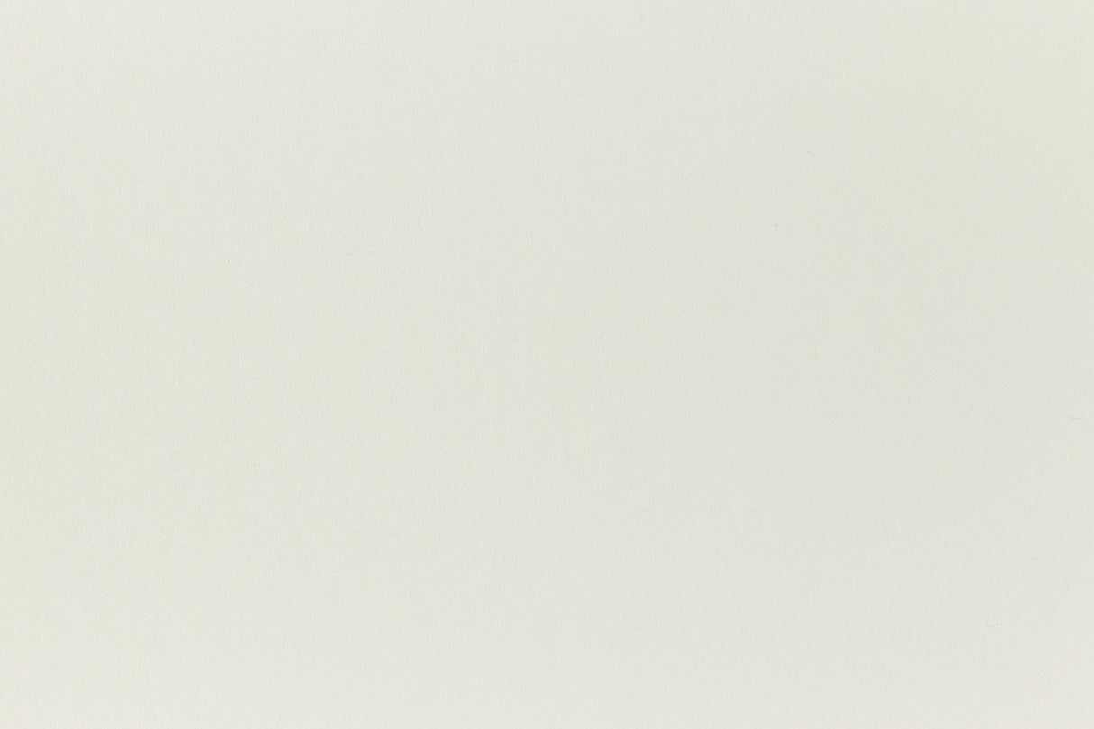 Very light green construction-style cardstock paper.