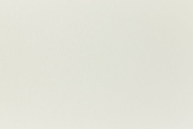 Very light green construction-style cardstock paper.