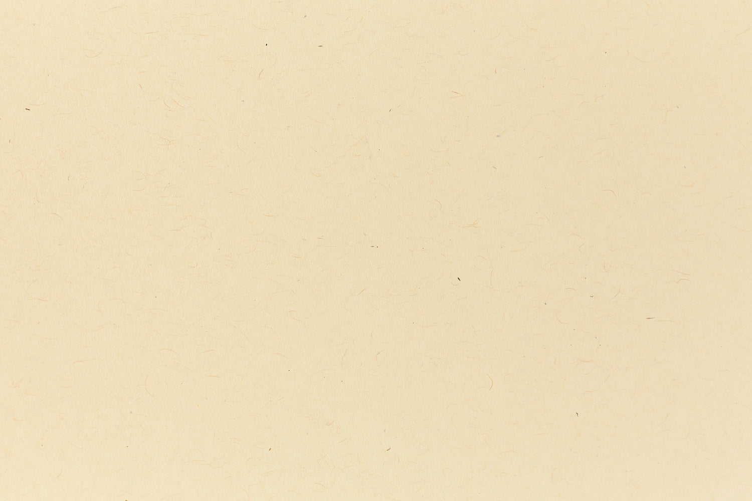 Deep yellow crafting paper shown in close detail.