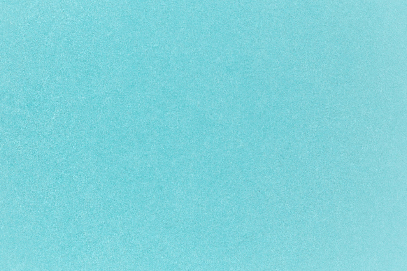Bright blue paper viewed in detail. 