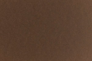 Chocolate colored crafting paper viewed in close detail.  