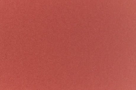 Brick red colored paper sample.