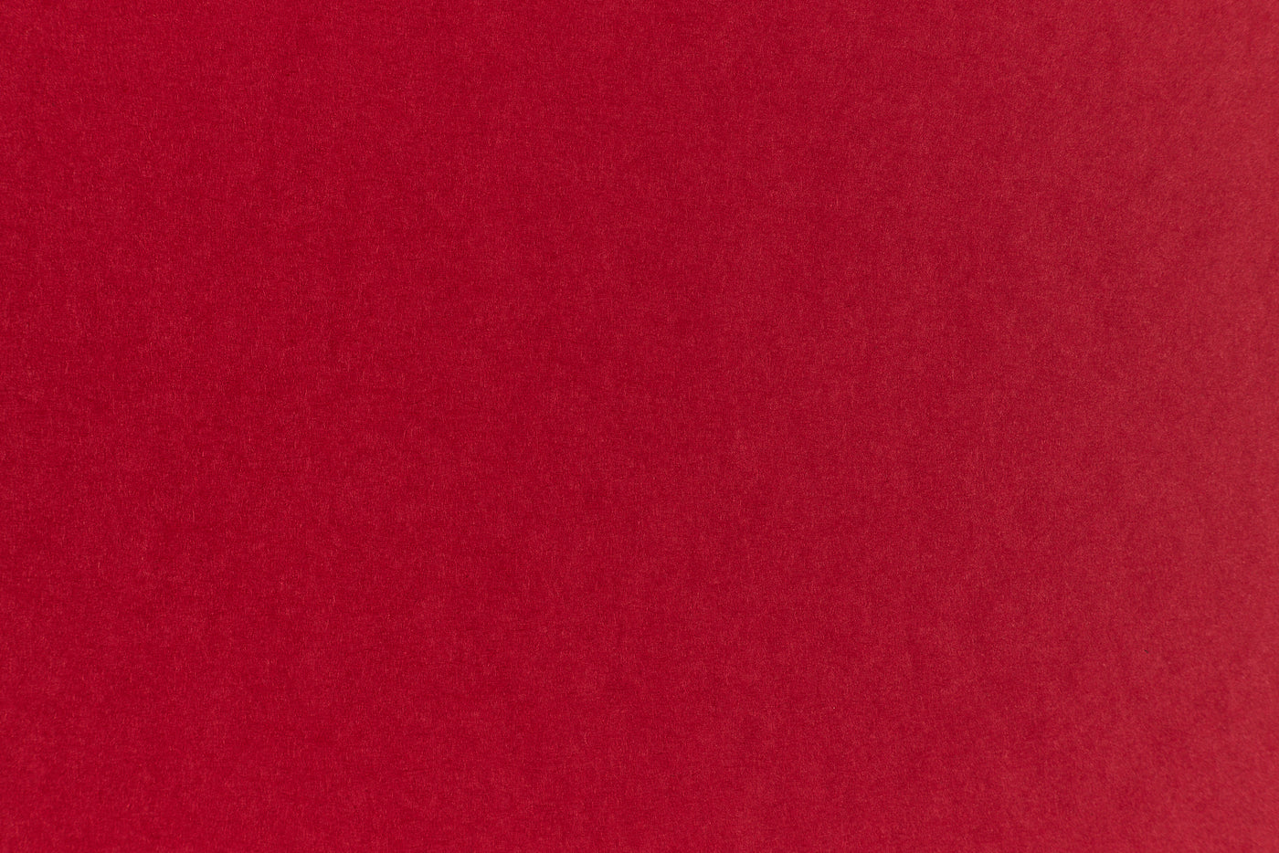 Brilliant red construction-style cardstock in close detail. 