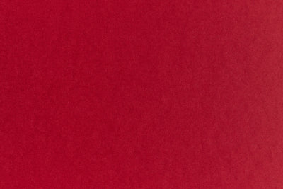 Brilliant red construction-style cardstock in close detail. 