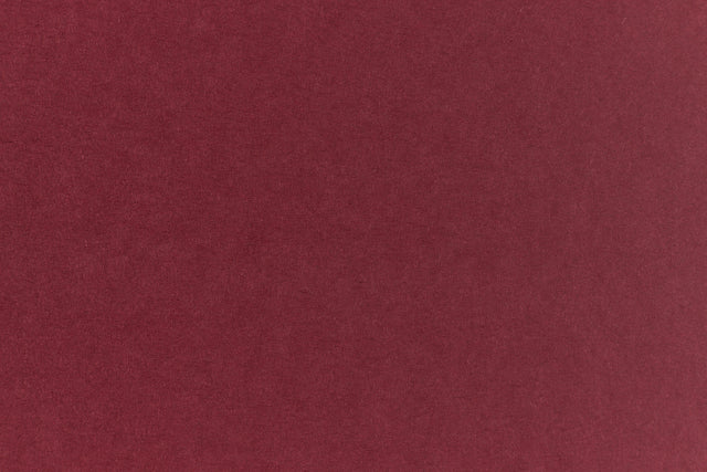 Deep, rich red crafting paper viewed in detail. 