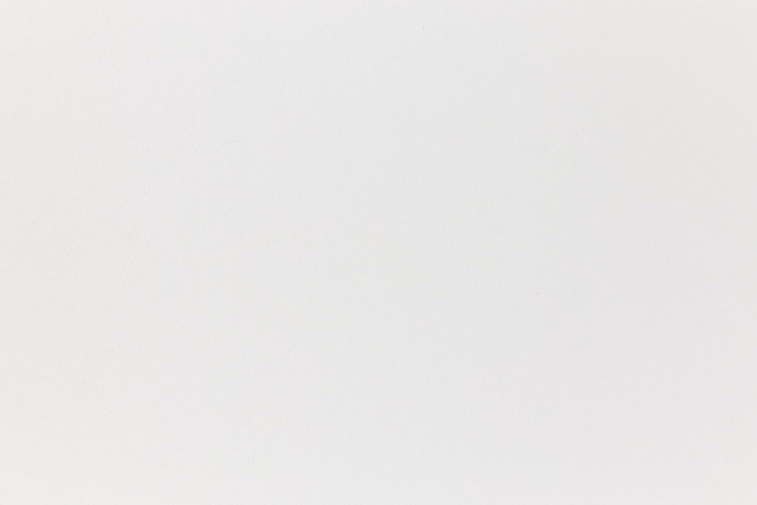 Close up view of white construction paper.