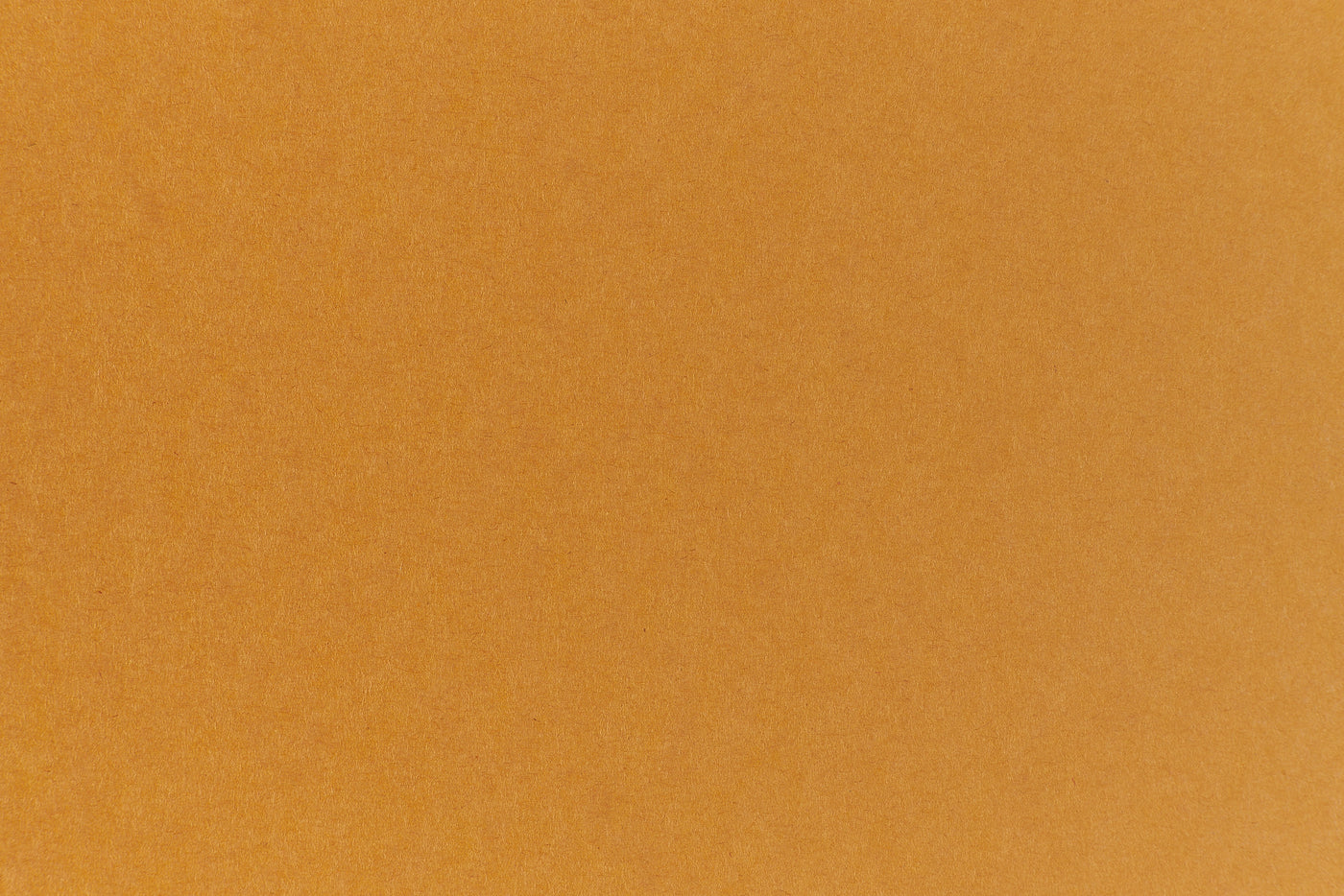 Deep orange cardstock paper for crafting.