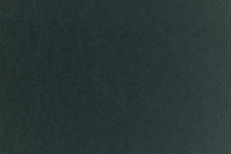Dark green construction-style cardstock paper in close detail. 