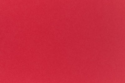 Light red cardstock crafting paper. 