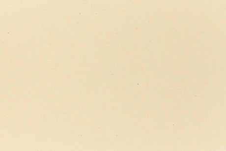 Deep yellow crafting paper shown in close detail. 