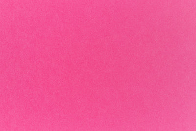 A purple-pink crafting paper sample. 