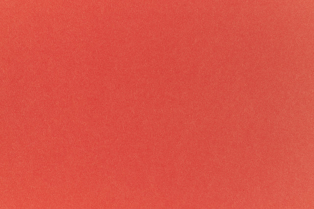 Bright orange crafting paper. 
