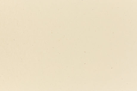 Off-white crafting paper in close detail. 
